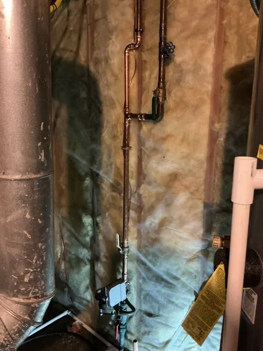 Copper water line exposed during a plumbing repair